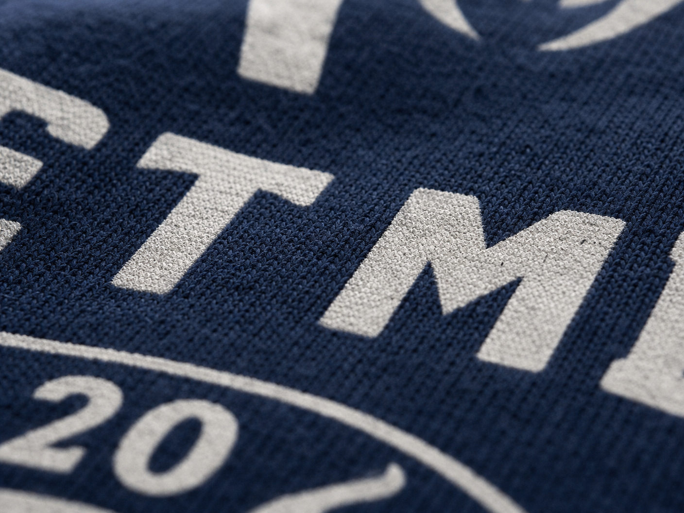 Screen printing press producing custom printed apparel for Irish teams and businesses